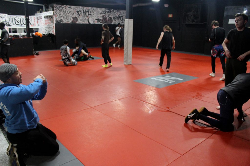 Wrestling Coach Joey Giving Instruction